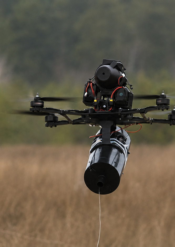 Operational drone carrying a specialist sensor payload